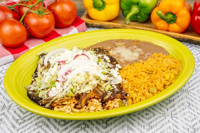 Enchiladas De Mole Poblano.